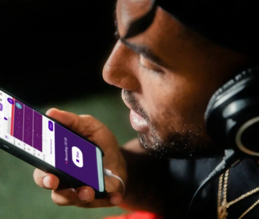 Person recording a conversation on a phone app